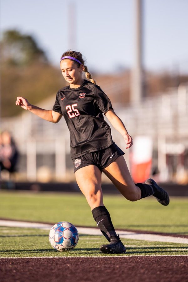 Starting since her freshman year, junior Ella Atkins helps lead the teams defense as an outside back.