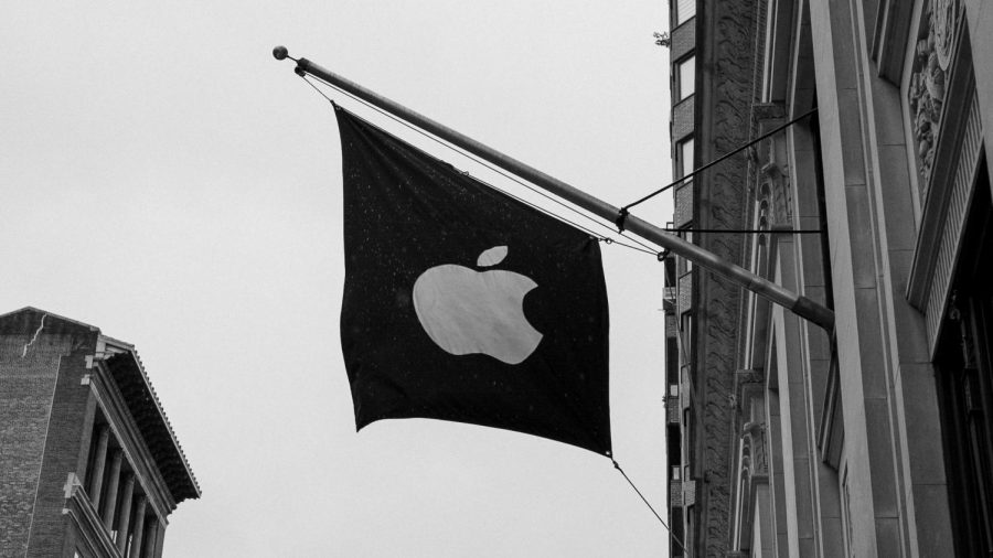 A company logo flag waves in front of an Apple store in New York City, New York. Apple announced the new Iphone 14 on September 7, 2022.