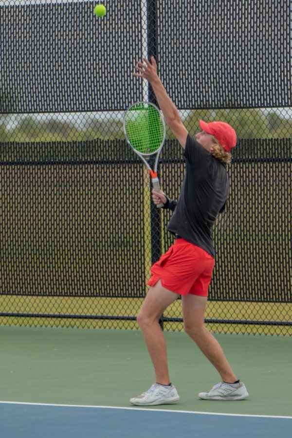 Senior Jacob Thompson competes in Bi-District tennis match at the Argyle High School tennis courts on October 11, 2022.