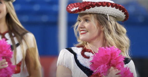 Drill Team Captain Grace Heldebrandt performs during the halftime show at Toyota Stadium in Frisco, TX Oct 14, 2022.