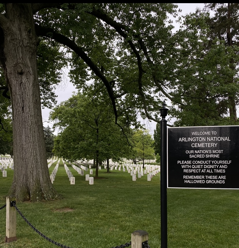 The Entrance into the Arlington National Cemetery, with a sign explaining its hallowed grounds. Taken May 29, 2023. 