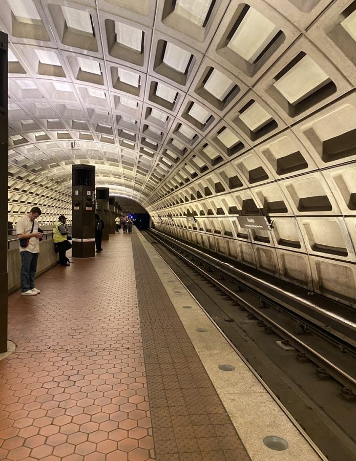 Passengers stand and wait for the DC Metro Blue Line. Taken on May 29, 2023.