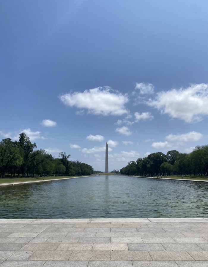 The Washington Monument stands over the Reflecting Pool. Taken on May 30, 2023.