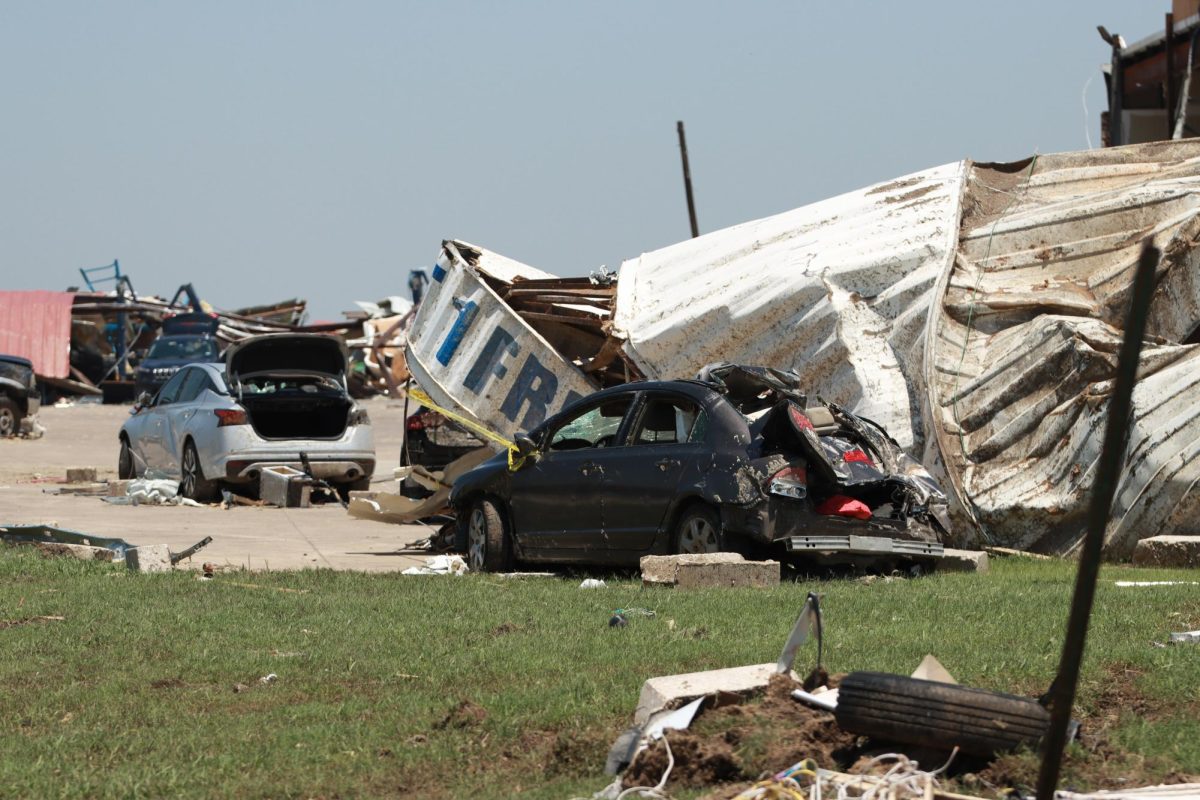 A car is crushed and a truck is mangled after a tornado hits a truck stop. Taken May 26, 2024. 