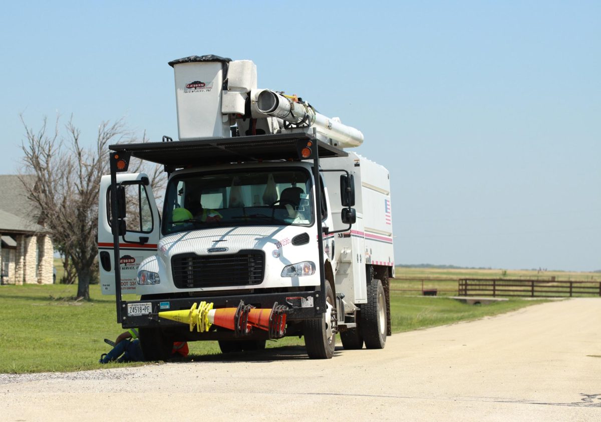 Utility trucks respond to power outages in Pilot Point, Texas.  Taken May 26, 2024. 