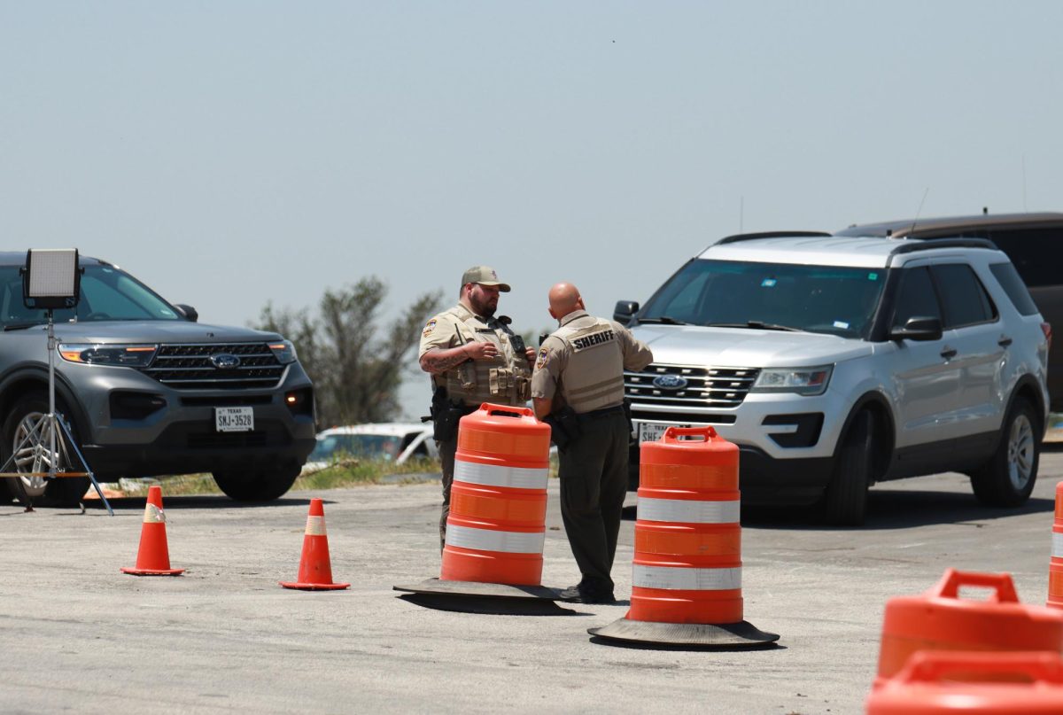 Cooke County Sheriffs block a bridge over Interstate 35 after receiving damage from a tornado. Taken May 26, 2024. 