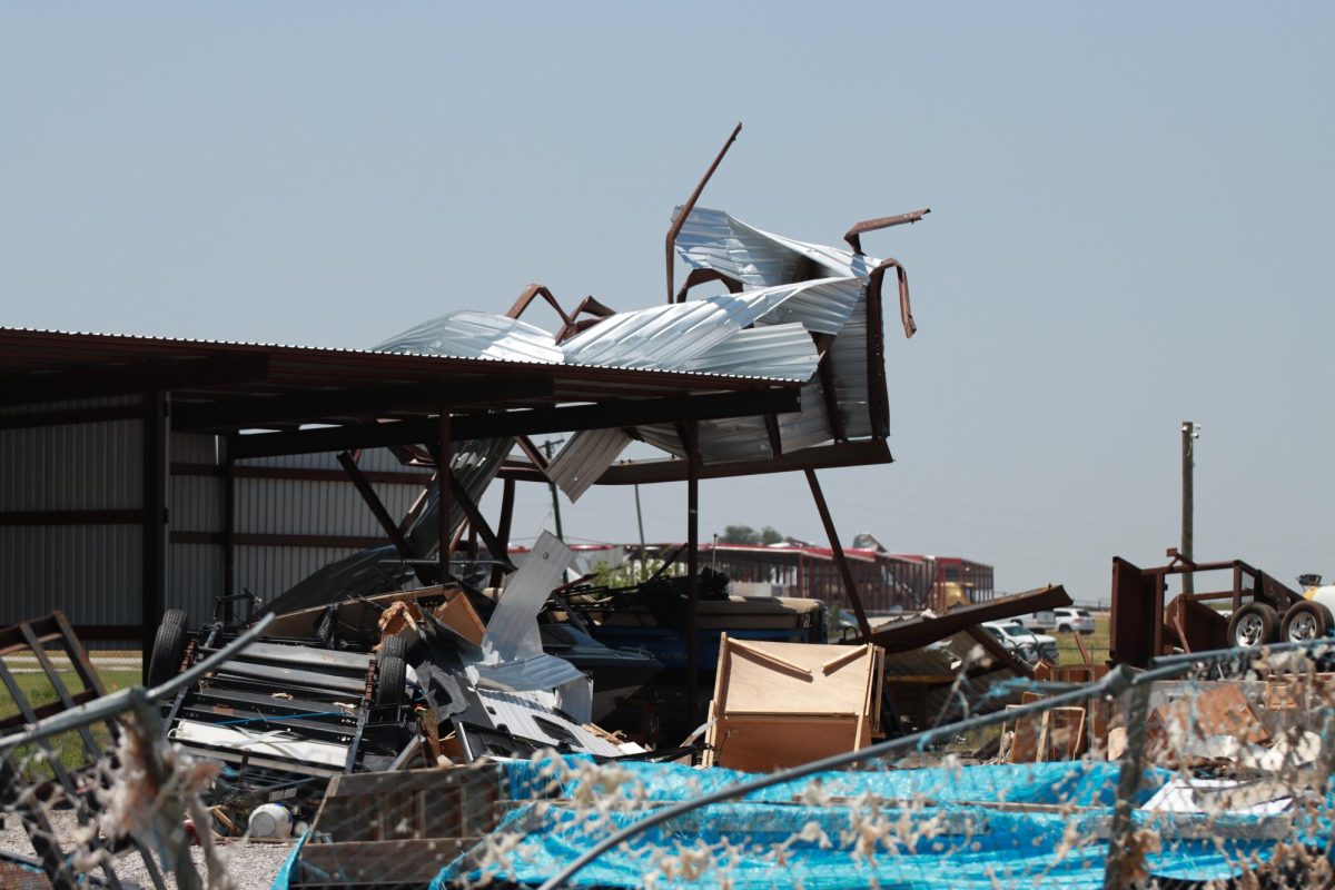 A metal warehouse is mangled after a tornado hits. Taken May 26, 2024.  