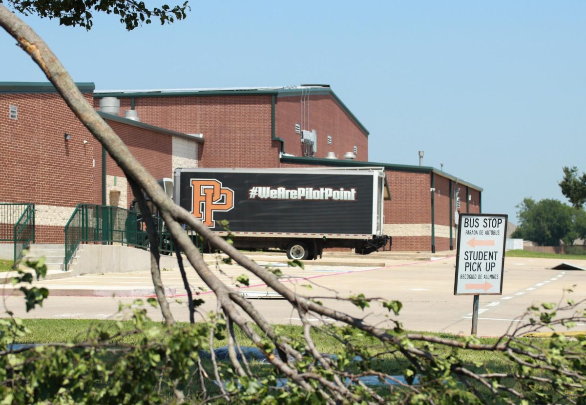 A Pilot Point ISD truck is parked in the parking lot of Pilot Point High School after a tornado hits. Taken May 26, 2024. 