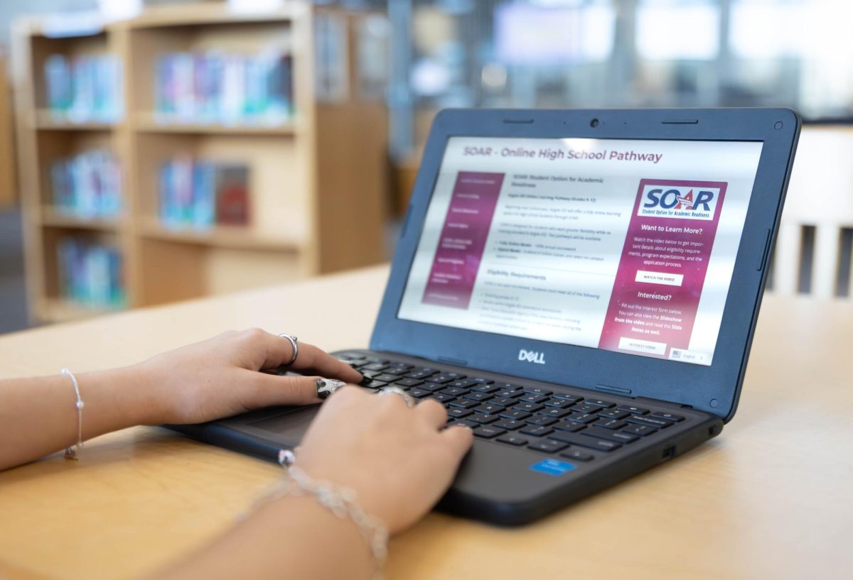 A student looks at the Argyle ISD SOAR website.